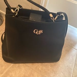 This is almost brand new guess purse